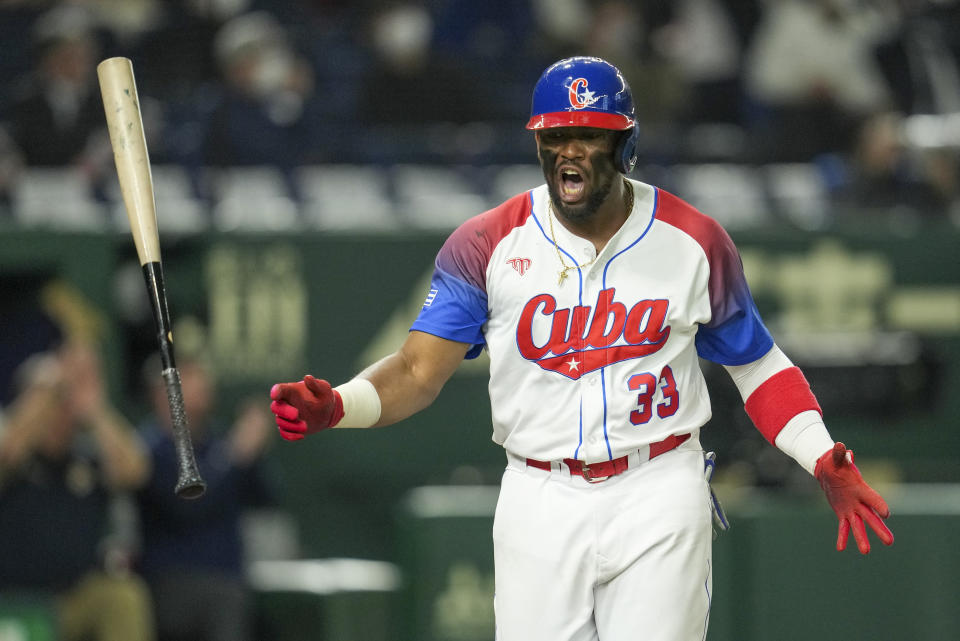 Yadir Drake of Cuba reacts while batting during the World Baseball Classic quarterfinal game between Cuba and Australia at the Tokyo Dome Tokyo, Wednesday, March 15, 2023. (AP Photo/Toru Hanai)