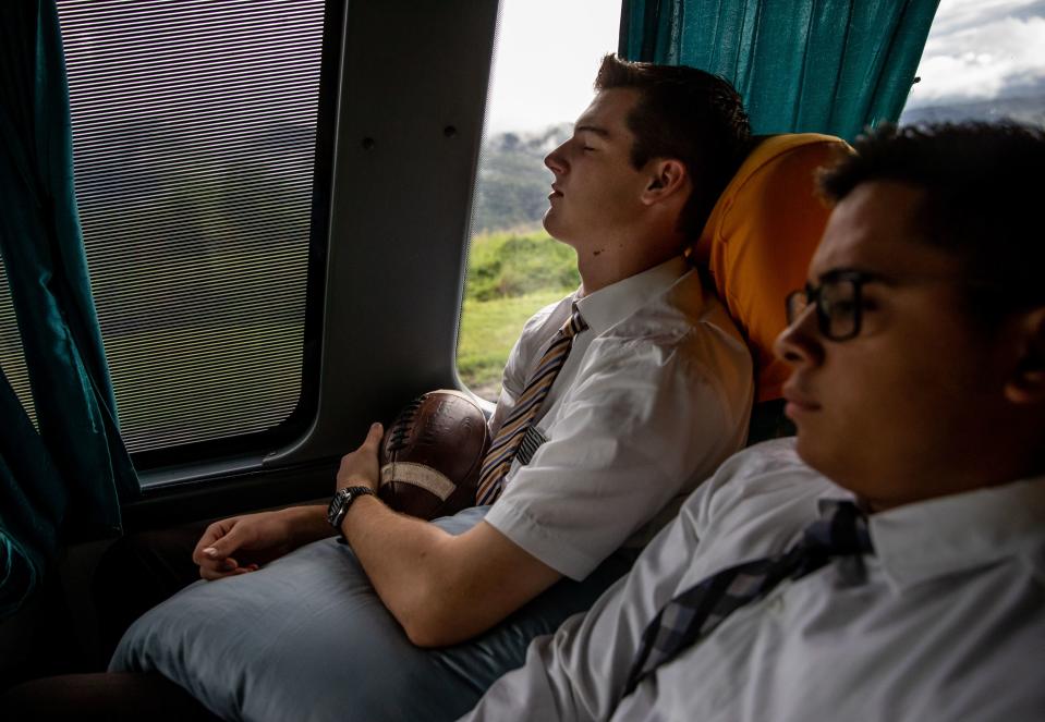 Elders Tanner McKee, left, and Pedro Cabral, missionaries for The Church of Jesus Christ of Latter-day Saints, ride a bus from Paranaguá to Curitiba, Brazil, as McKee transfers to a new area of the mission on Monday, June 3, 2019. | Spenser Heaps, Deseret News