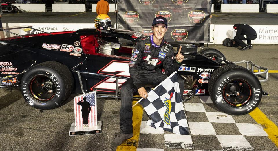 Mike Christopher Jr., driver of the #7, celebrates after winning The Jennerstown Salutes 150 for the NASCAR Whelen Modified Tour at Jennerstown Speedway in Jennerstown, Pennsylvania on May 28, 2022. (Nate Smallwood/NASCAR)