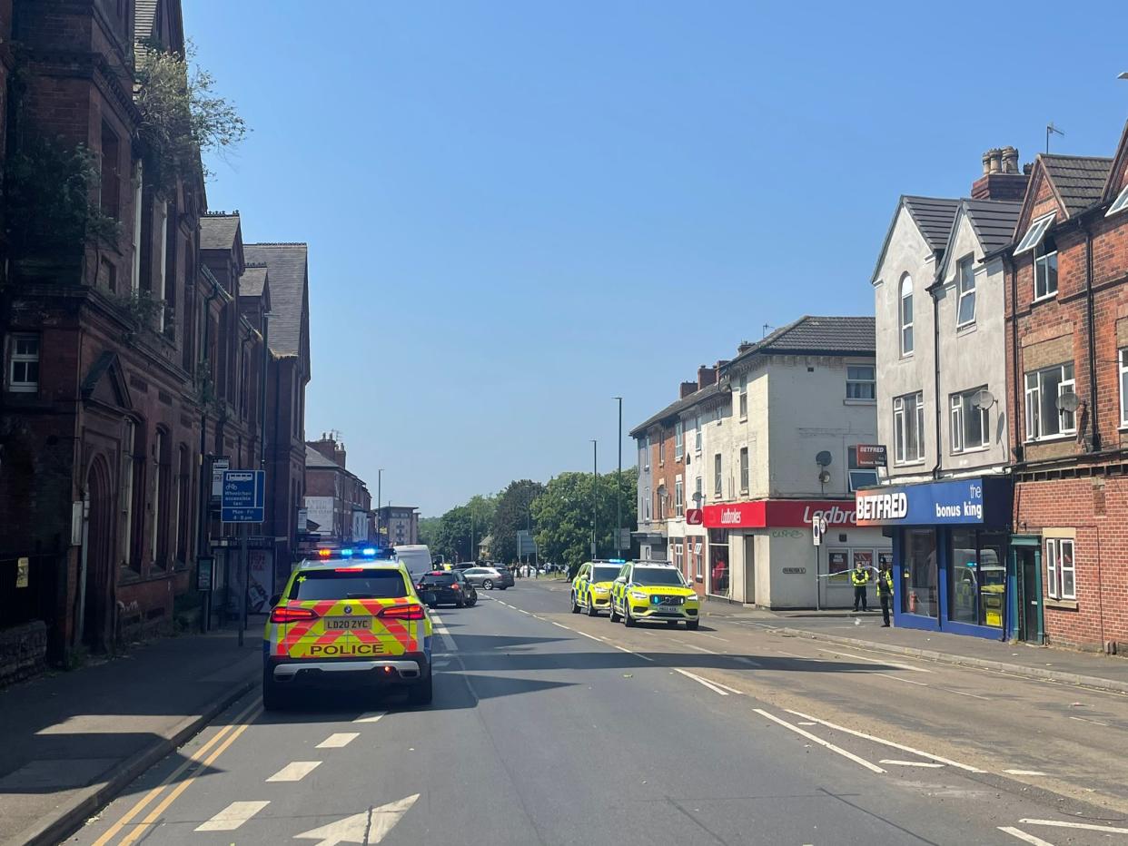 Police on the scene at Ilkeston Road (Holly Evans/The Independent)