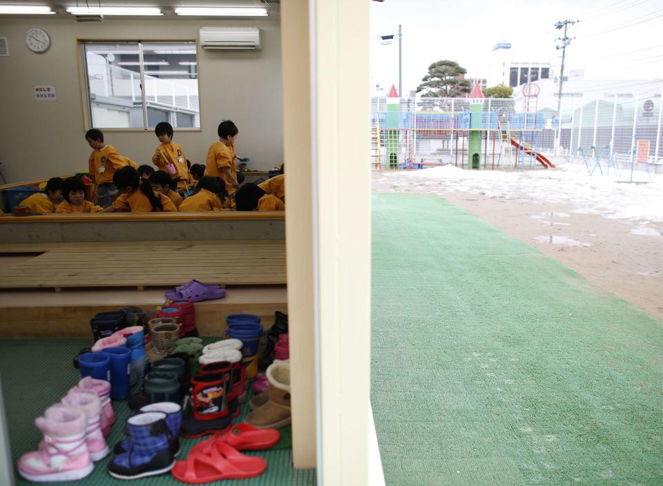 Children play at an indoor sand pit of the Emporium kindergarten in Koriyama, west of the tsunami-crippled Fukushima Daiichi nuclear power plant, Fukushima prefecture February 28, 2014. (REUTERS/Toru Hanai)