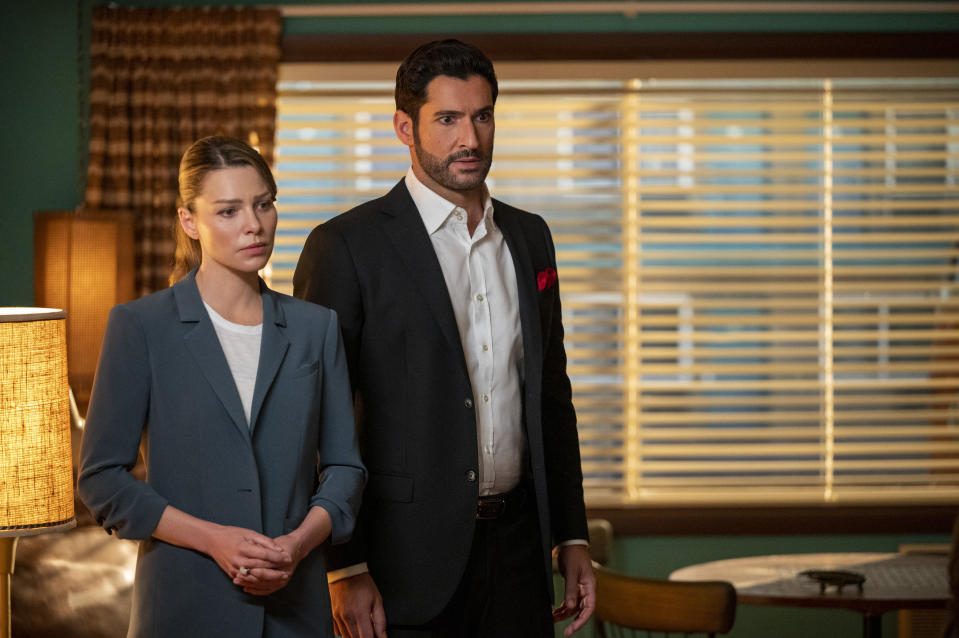 This image released by Netflix shows Lauren German, left, and Tom Ellis in a scene from "Lucifer." The final season of the popular supernatural series is streaming on Netflix. ( John P. Fleenor/Netflix via AP)