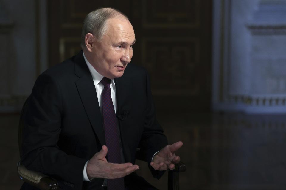 Russian President Vladimir Putin gestures while speaking during an interview with Rossiya Segodnya International Media Group Director General Dmitry Kiselev, in Moscow, Russia, Tuesday, March 12, 2024. (Gavriil Grigorov, Sputnik, Kremlin Pool Photo via AP)