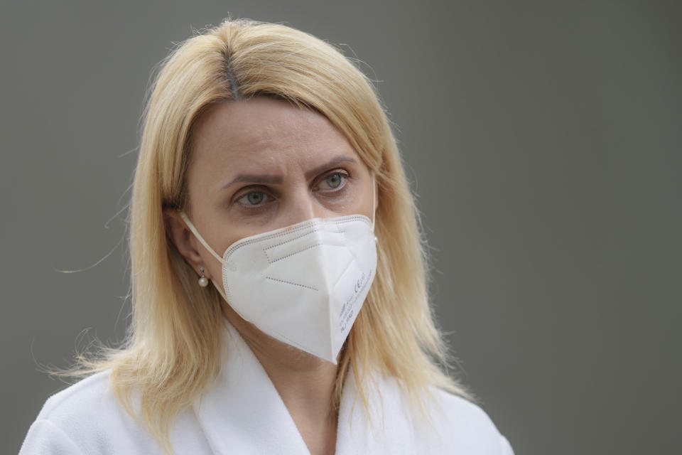 Beatrice Mahler, manager of the Marius Nasta National Pneumology Institute speaks during an interview with the Associated Press in Bucharest, Romania, Thursday, Sept. 23, 2021. Daily new coronavirus infections in Romania, a country of 19 million, have grown exponentially over the last month, while vaccine uptake has declined to worrying lows. Government data shows that 91.5% of COVID-19 deaths in Romania between Sept. 18-23 were people who had not been vaccinated. (AP Photo/Vadim Ghirda)