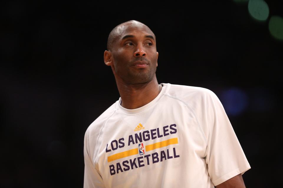 LOS ANGELES, CA - JANUARY 04: Kobe Bryant #24 of the Los Angeles Lakers looks on from the bench during the game against the Indiana Pacers at Staples Center on January 4, 2015 in Los Angeles, California.The Lakers won 88-87. NOTE TO USER: User expressly acknowledges and agrees that, by downloading and or using this photograph, User is consenting to the terms and conditions of the Getty Images License Agreement. (Photo by Stephen Dunn/Getty Images)