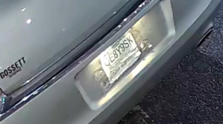 License plate of getaway vehicle for suspects accused of breaking into businesses with sledgehammer.