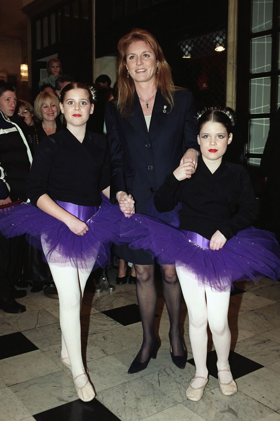 <p>Princess Beatrice and Princess Eugenie dressed as ballerinas in purple tutus while arriving with their mother, Sarah Ferguson, for "Santa's Starry Night" show at the Drury Lane Theatre. </p>