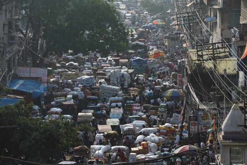 Crowd is seen at a market ahead of Diwali, the Hindu festival of lights, in the old quarters of Delhi