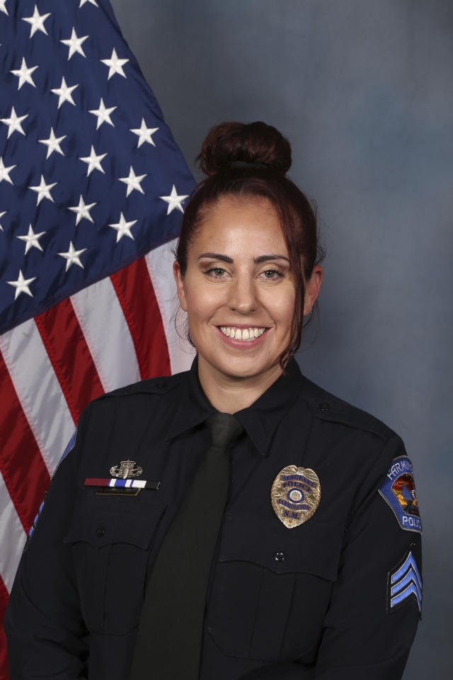 This undated photo provided by the Farmington Police Department in New Mexico shows Sgt. Rachel Discenza, one of two police officers wounded in a Monday, May 15, 2023, shooting that killed three people and wounded six others in Farmington. (Farmington Police Department via AP)