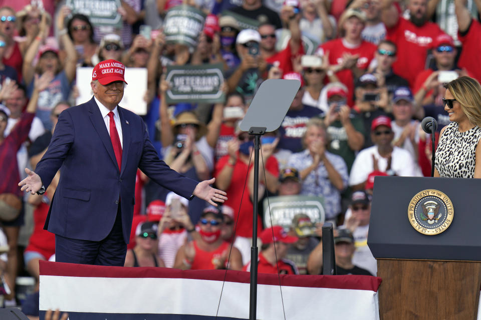 President Donald Trump gestures as he is introduced by first lady Melania Trump during a campaign rally Thursday, Oct. 29, 2020, in Tampa, Fla. (AP Photo/Chris O'Meara)