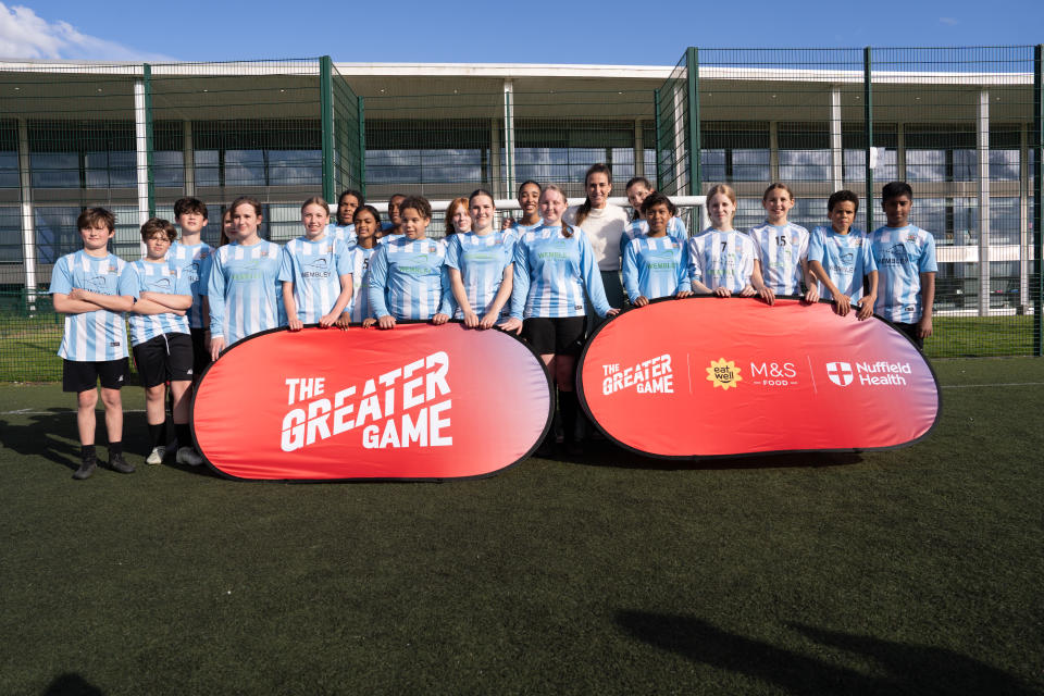 Former England Lionesses captain Jill Scott and players from Brent Schools football team at the launch of The FA's The Greater Game programme