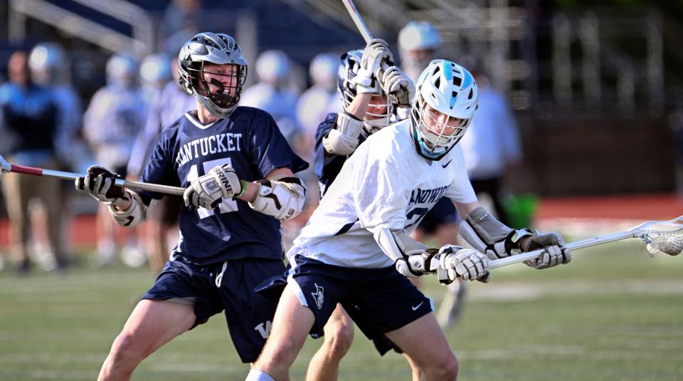SANDWICH  4/25/23    Cole Rodgers of Sandwich prepares to fire a shot defended by Michael Culkins of Nantucket.