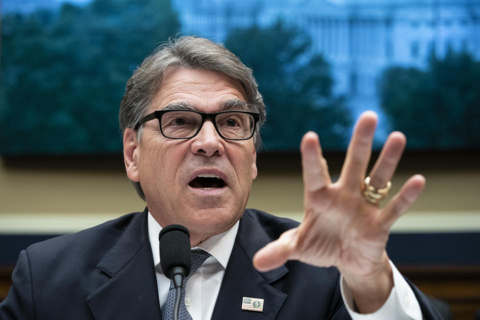 FILE - In this May 9, 2019, file photo, Energy Secretary Rick Perry testifies before the House Energy and Commerce Committee on his future budget request, on Capitol Hill in Washington. Long after more flamboyant Cabinet colleagues fell out of President Donald Trump’s favor amid ethics scandals, low-profile Perry, the folksy former Texas governor, survived in part by steering clear of controversy as energy secretary. (AP Photo/J. Scott Applewhite, File )