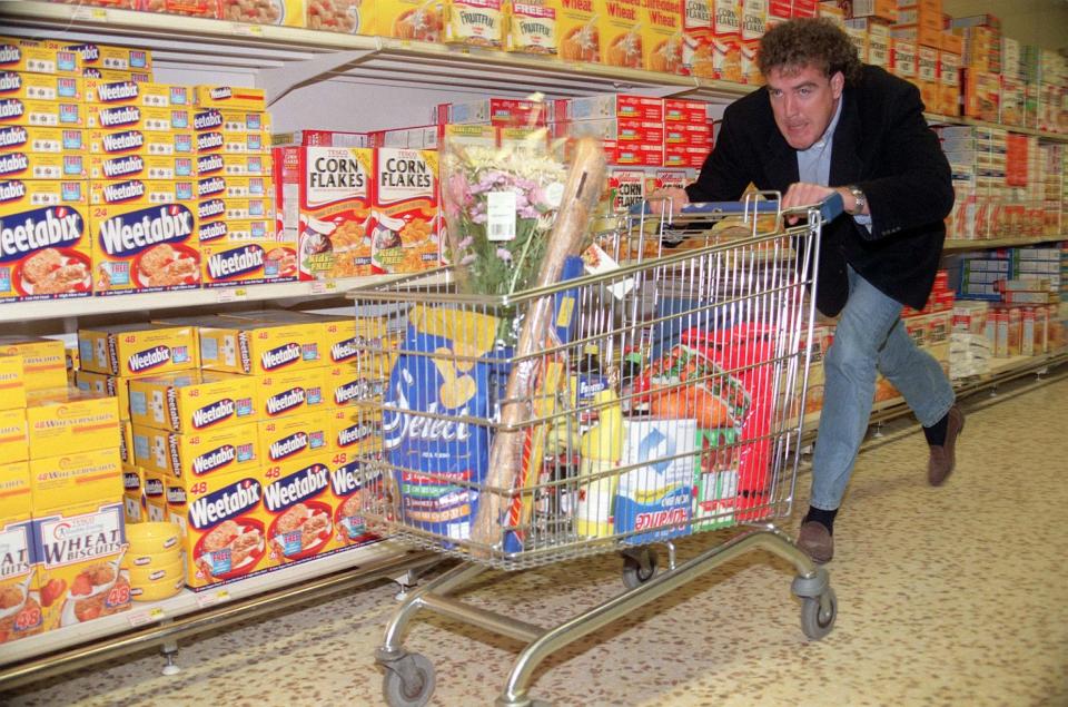 Top Gear presenter Jeremy Clarkson puts one of Tesco's re-fitted shopping trolleys through its paces in the company's Hooverbuilding store, west London, this morning (Friday). The firm have spent  4 million fitting new steering devices to their fleet of trolleys in an attempt to stop them having a "mind of their own". It is hoped the refit of their 200,000 trolleys will be completed by October 1997. Photo by Matthew Fearn/PA.