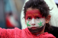 A Druze girl takes part in a rally over U.S. President Donald Trump's support for Israeli sovereignty over the Golan Heights, in Majdal Shams near the ceasefire line between Israel and Syria in the Israeli occupied Golan Heights March 23, 2019 REUTERS/Ammar Awad