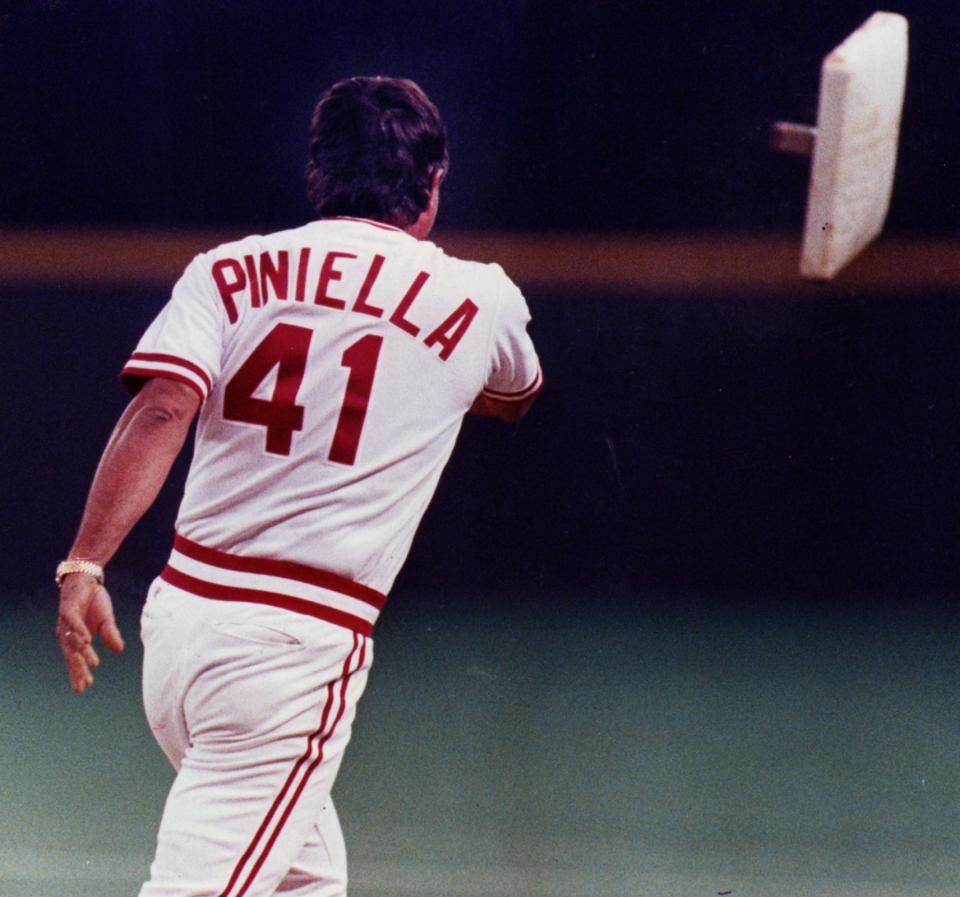 AUGUST 21, 1990: Reds Manager Lou Piniella threw first base into right field while disputing Barry Larkin being out at first base during a double play in the 6th inning. He launched first base after being ejected from the game.