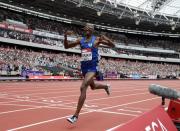 July 23, 2016; London, United Kingdom; Mo Farah (GBR) celebrates after winning the 5,000m in 12:59.29 in the London Anniversary Games during an IAAF Diamond League meet at Olympic Stadium. Kirby Lee-USA TODAY Sports