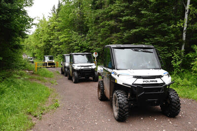 All-electric Polaris RANGER XP Kinetic off-road vehicles on off-road trails near Ontonagon, Michigan. (Photo by Daniel Boczarski/Getty Images for Polaris)