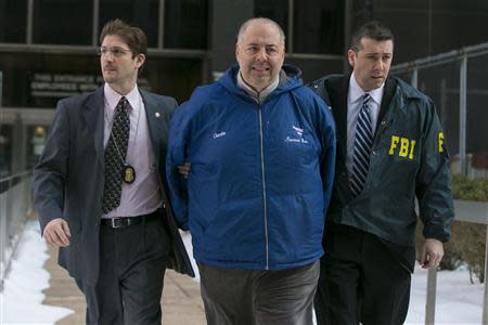 Bonanno family associate Charles Centaro (C ), also known as �Charlie Pepsi,� is escorted by FBI agents from their Manhattan offices in New York February 11, 2014. REUTERS/Brendan McDermid