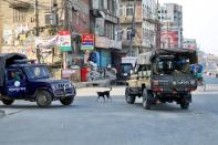Members of the Bangladesh Army are seen on a vehicle, patrolling during countrywide lockdown for coronavirus disease (COVID-19) outbreak in Dhaka