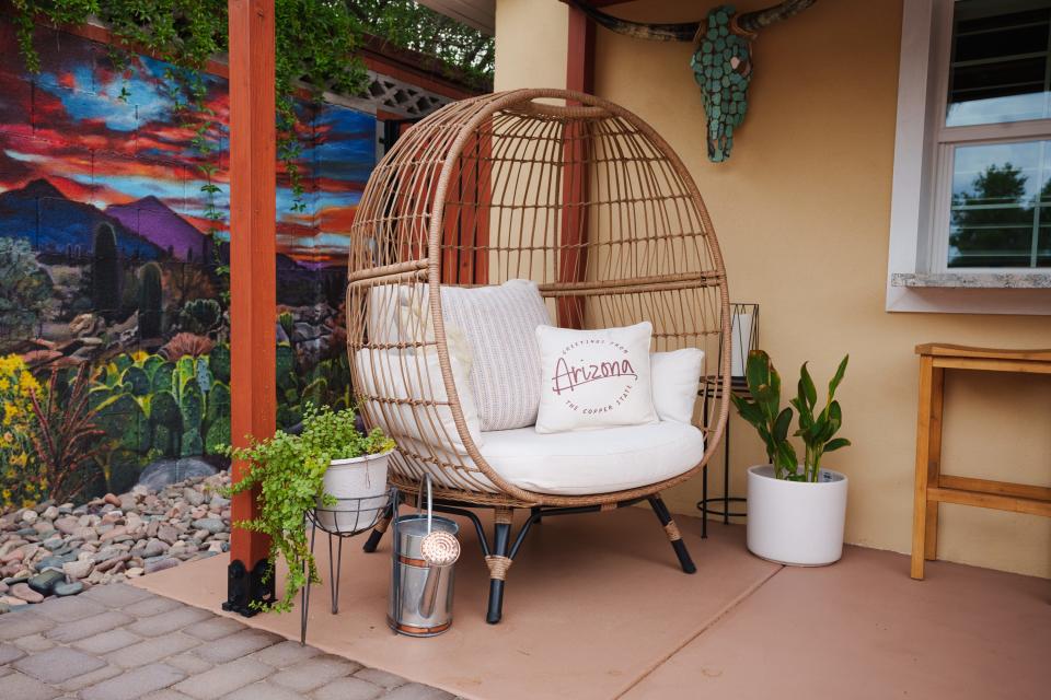 The porch of Josh Knapp's "Sunset Casita" Airbnb, photographed on Aug. 12, 2022 in Phoenix. Decor at the Airbnb is Arizona-themed, including a desert mural by local artist, Maggie Keane.
