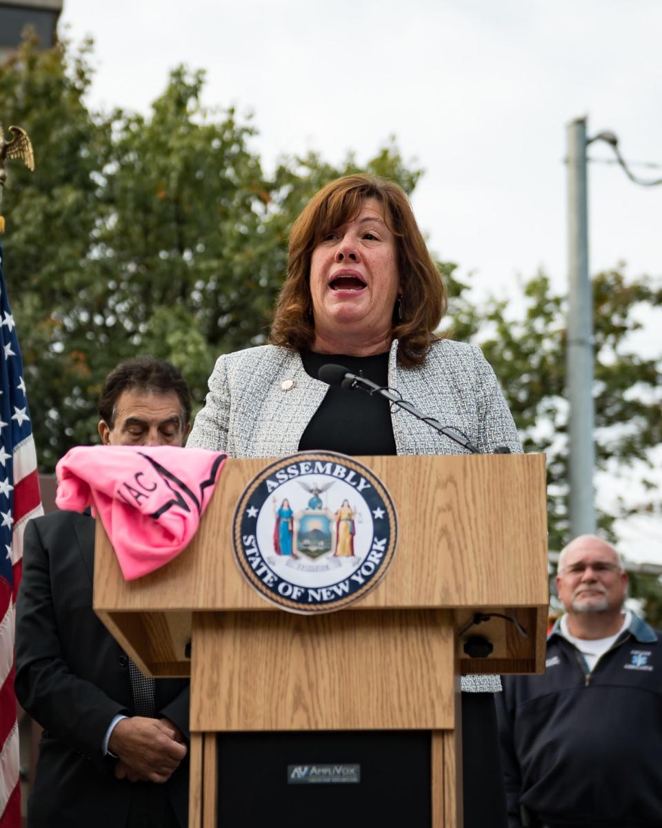 New York State Assemblywoman Marianne Buttenschon, alongside ambulance service providers, held a unified call to action urging Governor Kathy Hochul to sign the "direct pay" legislation into law at the Utica State Office Building in Utica, NY on Thursday, October 12, 2023.