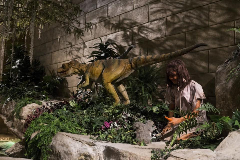 <div class="inline-image__caption"><p>A stone-age woman sits next to a dinosaur in the front lobby at the Creation Museum—even though there is no scientific evidence the two co-existed.</p></div> <div class="inline-image__credit">Brittany Greeson/Reuters</div>