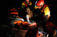 A migrant is rescued by members of the Spanish NGO Open Arms during a rescue operation in the Mediterranean sea late Sunday, Sept. 18, 2022. This was the year war returned to Europe, and few facets of life were left untouched. Russia’s invasion of its neighbor Ukraine unleashed misery on millions of Ukrainians, shattered Europe’s sense of security, ripped up the geopolitical map and rocked the global economy. The shockwaves made life more expensive in homes across Europe, worsened a global migrant crisis and complicated the world’s response to climate change. (AP Photo/Petros Karadjias)