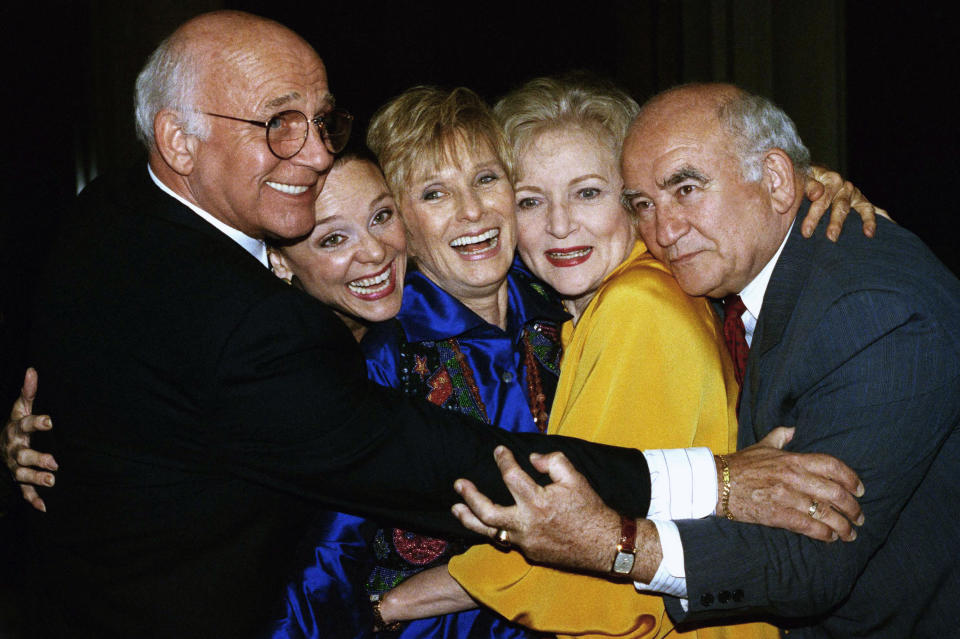 FILE - Former cast members of the Mary Tyler Moore Show, sans Mary Tyler Moore, are reunited for the Museum of Television and Radio's 9th annual Television Festival in Los Angeles on March 21, 1992. From left are Gavin MacLeod, Valerie Harper, Cloris Leachman, Betty White and Ed Asner. Betty White, whose saucy, up-for-anything charm made her a television mainstay for more than 60 years, has died. She was 99. (AP Photo/Craig Fujii, File)