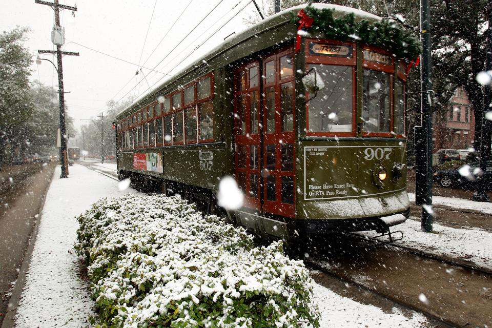 Snow falls on the St. Charles Avenue streetcar on December 11, 2008 in New Orleans, Louisiana.