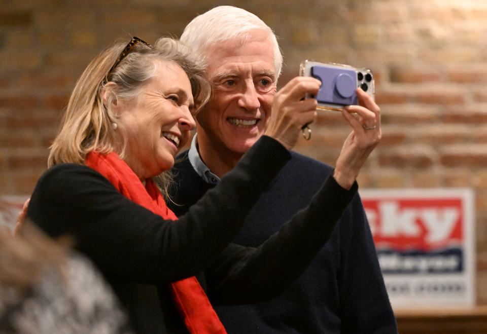 Elizabeth Corker takes a photo with Rocky Anderson at a watch party in Salt Lake City on Tuesday, Nov. 21, 2023. | Scott G Winterton, Deseret News