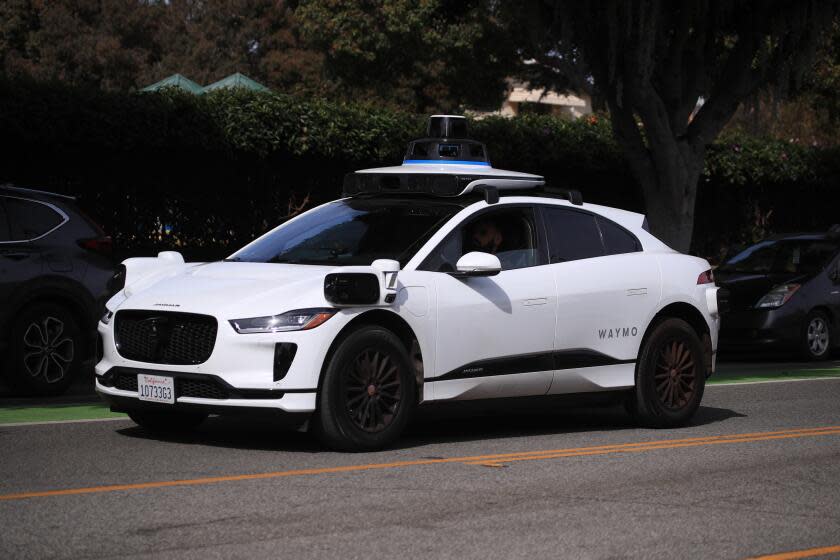 Santa Monica, CA - February 21: Passengers ride in an electric Jaguar I-Pace car outfitted with Waymo full self-driving technology in Santa Monica Tuesday, Feb. 21, 2023. (Allen J. Schaben / Los Angeles Times)