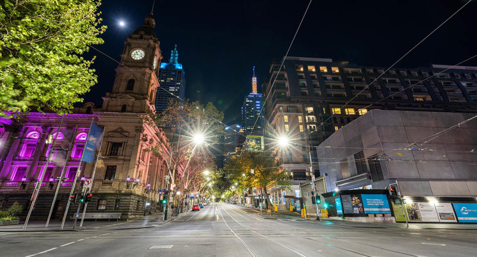Empty streets near Melbourne Town Hall on the corner of Collins and Swanston street during Melbourne's Covid-19 restrictions.