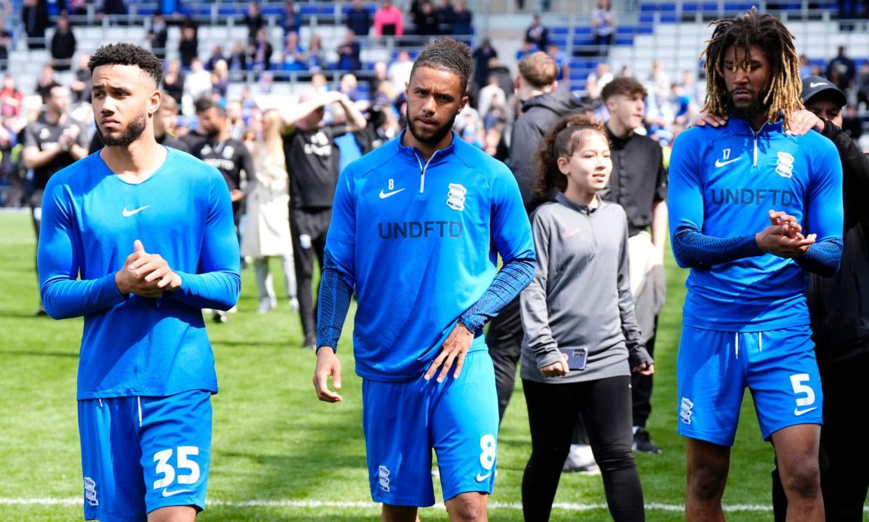 <span>Birmingham's George Hall, Tyler Roberts and Dion Sanderson applaud fans after the club’s relegation was confirmed.</span><span>Photograph: Nick Potts/PA</span>