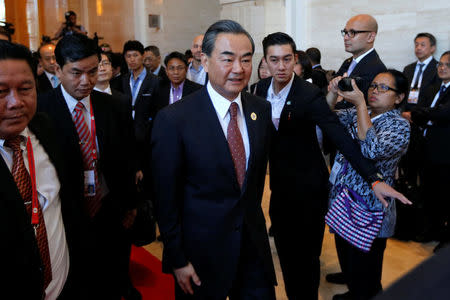 China's Foreign Minister Wang Yi arrives at a meeting at the sidelines of the ASEAN foreign ministers meeting in Vientiane, Laos July 25, 2016. REUTERS/Jorge Silva