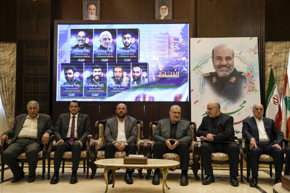 Iranian Ambassador to Lebanon, Mojtaba Amani, second right, speaks with the head of Hezbollah's parliamentary bloc, Mohammed Raad, third right, Qatari Ambassador to Lebanon, Sheikh Saud bin Abdul Rahman bin Faisal Thani Al Thani, second left, and Hamas representative in Lebanon Ahmad Abdul-Hadi, third left, as he receives condolences for the death of the Iranian Revolutionary Guard Gen. Mohammad Reza Zahedi, who led the Iranian Revolutionary Guard's Quds Force in Lebanon and Syria until 2016, and six other Iranian military officials at the Iranian embassy in Beirut, Lebanon, Monday, April 8, 2024. An Israeli airstrike that demolished Iran's consulate in Syria on last Monday killed two Iranian generals and five officers, according to Iranian officials. The strike appeared to signify an escalation of Israel's targeting of military officials from Iran, which supports militant groups fighting Israel in Gaza, and along its border with Lebanon. (AP Photo/Hassan Ammar)