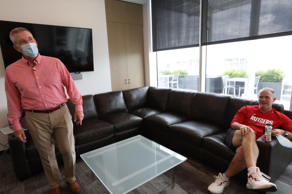 Rutgers Athletic Director Pat Hobbs with men's basketball coach Steve Pikiell in Pikiell’s office in the RWJBarnabas Health Athletic Performance Center, one of two new athletic facilities on the campus of Rutgers University.