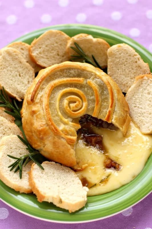 <p>Willow Bird Baking</p><p>Rosemary and figs add amazing flavor to the usual crusty baked brie.</p><p><strong>Get the recipe: <a href="http://willowbirdbaking.com/2012/02/23/brie-en-croute-with-figs-rosemary/" rel="nofollow noopener" target="_blank" data-ylk="slk:Brie En Croute with Figs and Rosemary;elm:context_link;itc:0;sec:content-canvas" class="link ">Brie En Croute with Figs and Rosemary</a></strong></p>