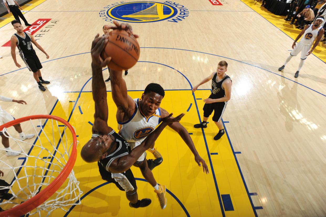 Joel Anthony, who is still in the NBA, blocks a dunk attempt by Golden State's Damian Jones late in Game 2. (Andrew D. Bernstein/NBAE/Getty Images)