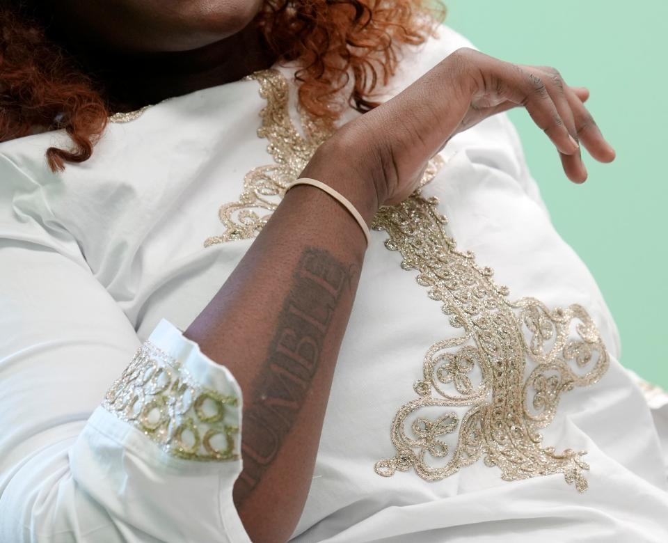 Fatima Turay, who is among tens of thousands of housing insecure college students in Columbus and across the United States, has a forearm tattoo that reads, "humble." Turay wants to create a better life for 2-year-old daughter Daejore but like many others in her situation has struggled with the challenges of balancing school, work and raising a child.