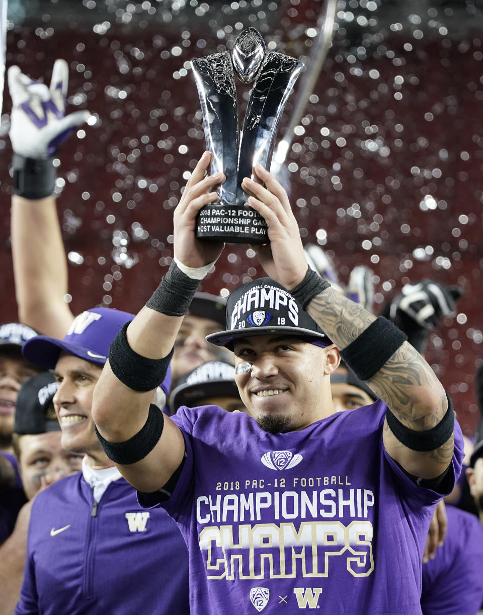 Washington defensive back Byron Murphy celebrates after Washington defeated Utah 10-3 in the Pac-12 Conference championship NCAA college football game in Santa Clara, Calif., Friday, Nov. 30, 2018. (AP Photo/Tony Avelar)