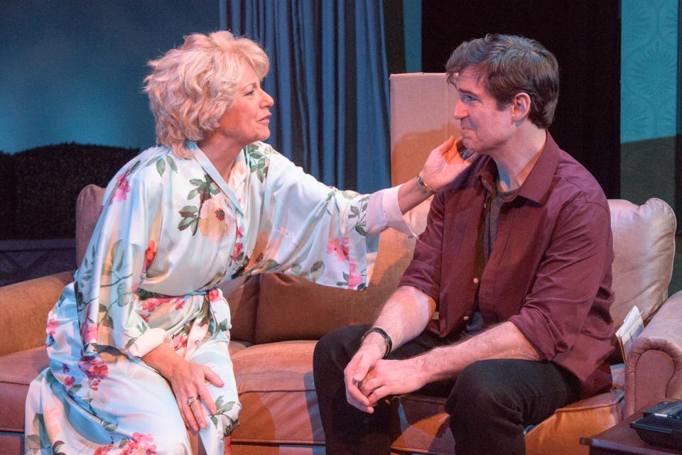 Jean Tafler, left, plays the mother of a photographer, played by Gil Brady, in “Pictures From Home” at Florida Studio Theatre.