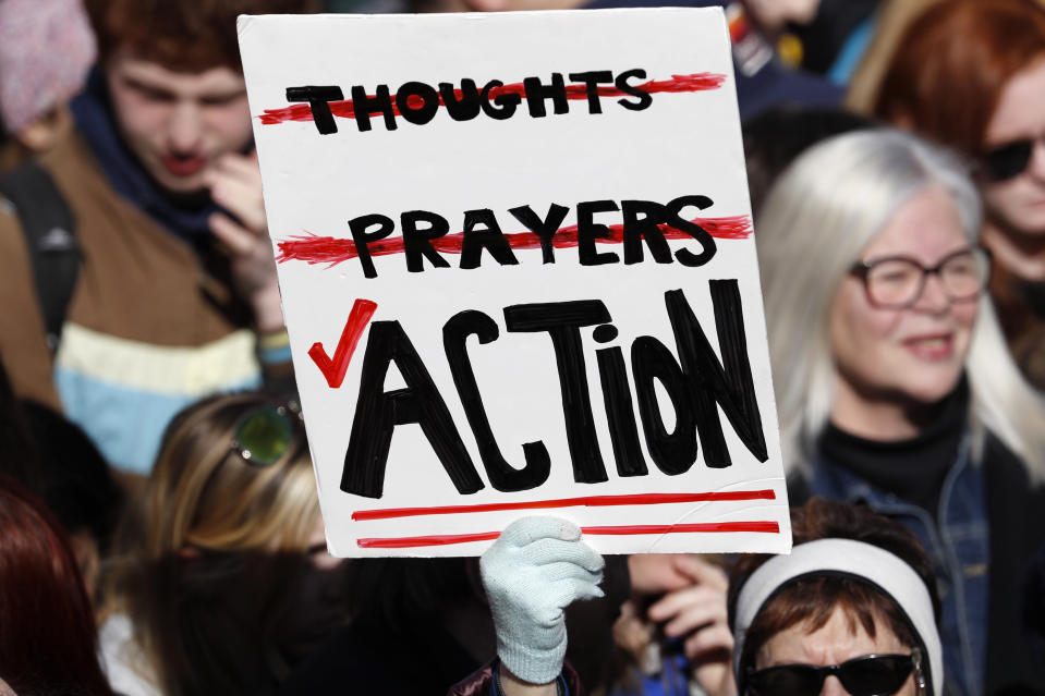 <p>Participants carry signs as students and gun control advocates hold March for Our Lives rally in Washington, D.C. (Photo: Aaron P. Bernstein/Reuters) </p>