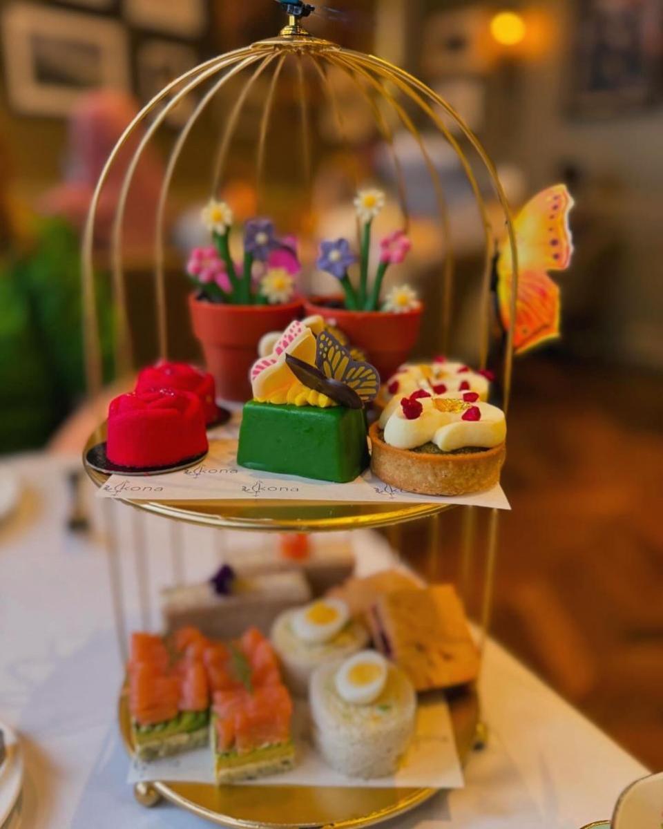 News Shopper: The afternoon tea came served in a gold birdcage and featured an assortment of sweet and savoury treats.