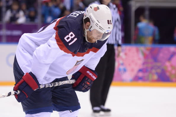 US Phil Kessel holds his hockey stick following the team's 0-1 defeat to Canada in the Men's Ice Hockey Semifinals USA vs Canada at the Bolshoy Ice Dome during the Sochi Winter Olympics on February 21, 2014. AFP PHOTO / ANDREJ ISAKOVIC (Photo credit should read ANDREJ ISAKOVIC/AFP/Getty Images)