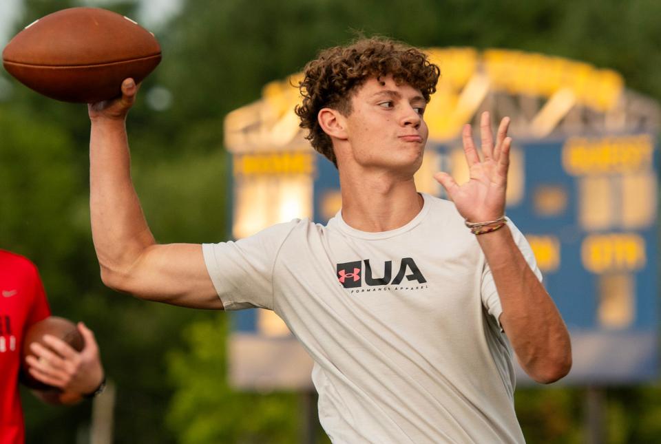 Hudson quarterback Jake Attaway throws during a drill at the M2 QB Academy on Monday.