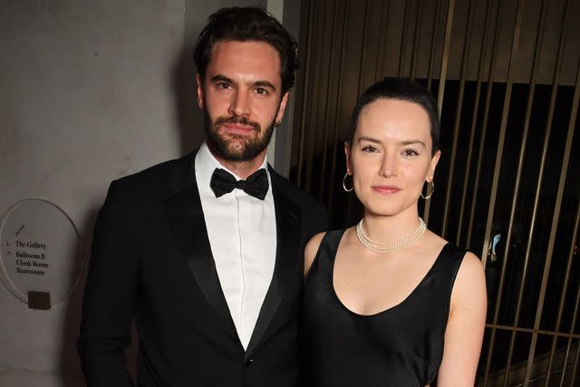 <p>David M. Benett/Dave Benett/Getty</p> Daisy Ridley and Tom Bateman at he BFI Luminous Fundraising Gala at The Londoner Hotel on September 29, 2022