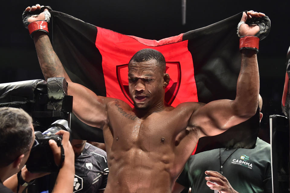 Nov 4, 2023; Sao Paulo, Brazil; Jailton Almeida (red gloves) reacts after defeating Derrick Lewis (not pictured) during UFC Fight Night at Ibirapuera Arena. Mandatory Credit: Jason da Silva-USA TODAY Sports