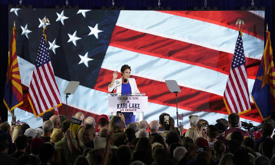 Republican candidate Kari Lake announces her plans to run for the Arizona U.S. Senate seat during a rally, Tuesday, Oct. 10, 2023, in Scottsdale, Ariz. (AP Photo/Ross D. Franklin)