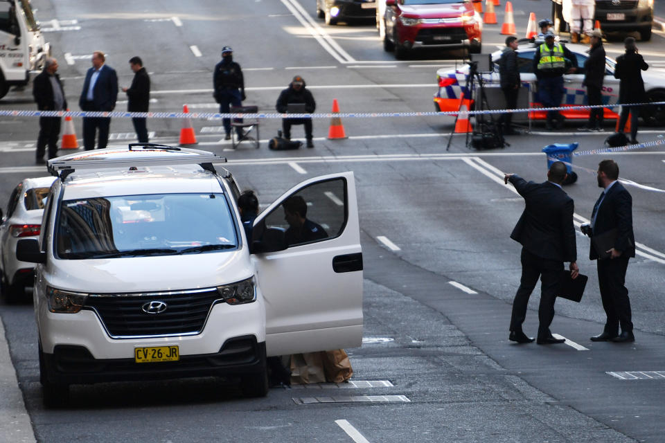 Police work at the scene of a fatal shooting on Bridge Street in the CBD, Sydney, Friday, June 18, 2021. Source: AAP